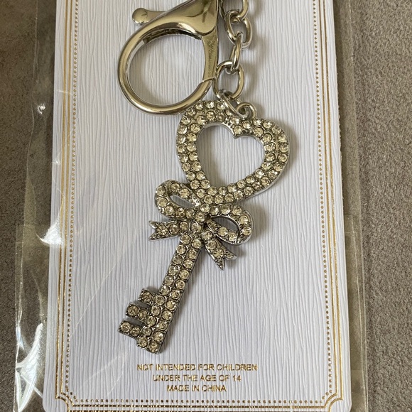 Accessories - 🎀 5 for $25 🎀 heart key keychain / bag charm with bow silver hardware.